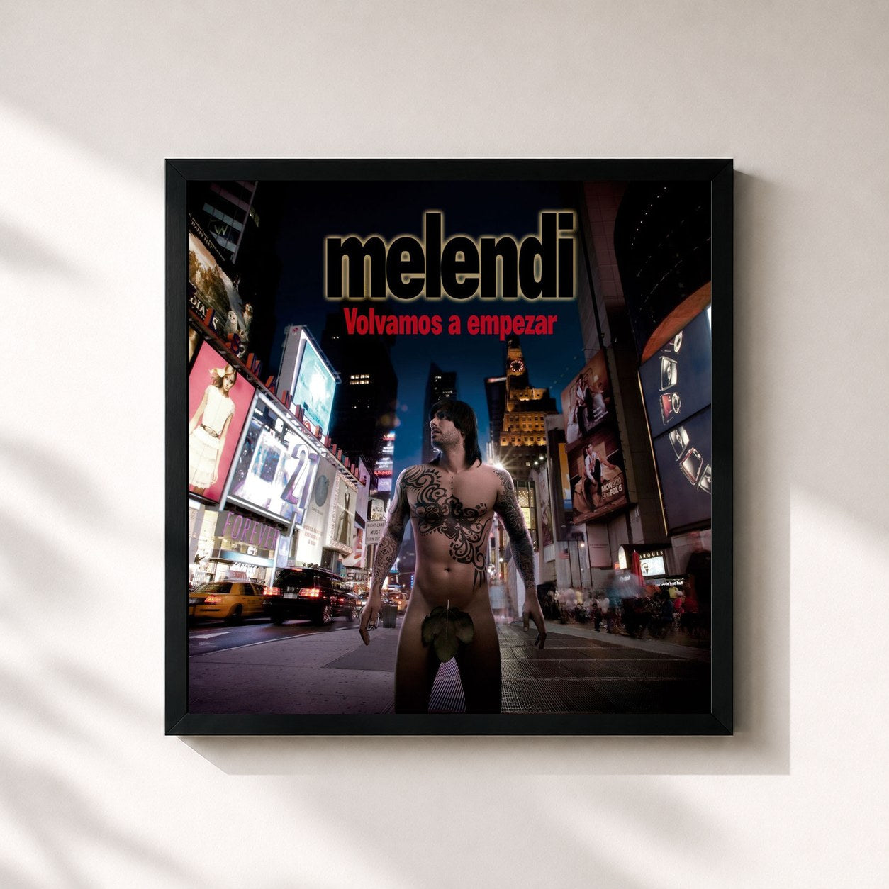 #noir Tableau carré de l'album Volvamos a empezar de Melendi, cadre noir 32x32 cm