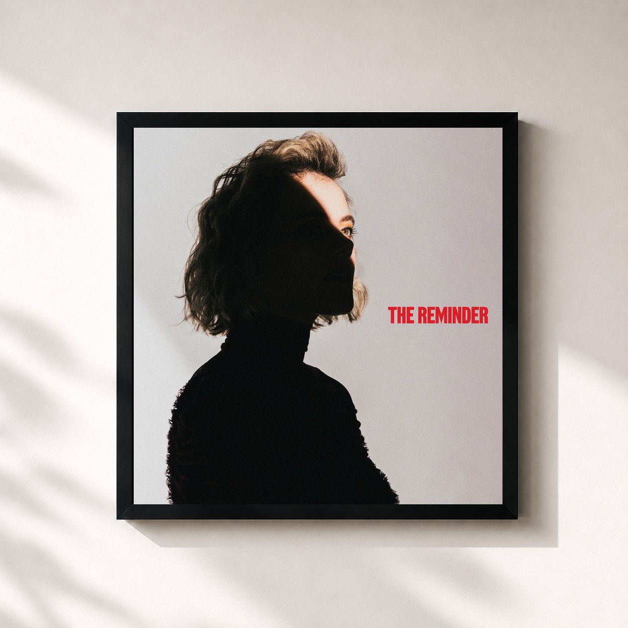 #noir Tableau carré de l'album The Reminder (Deluxe) de TAYA, cadre noir 32x32 cm