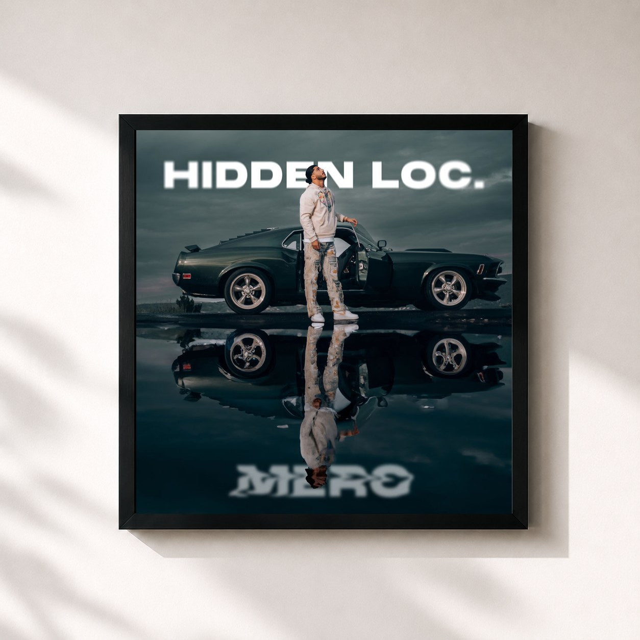 #noir Tableau carré de l'album Hidden Loc. de MERO, cadre noir 32x32 cm