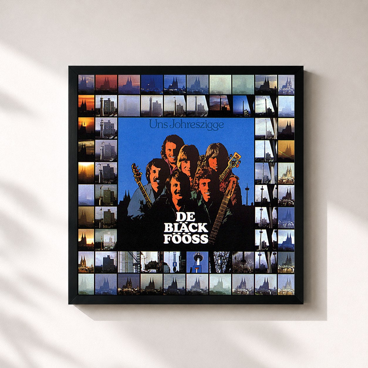 #noir Tableau carré de l'album Uns Johreszigge de Bläck Fööss, cadre noir 32x32 cm