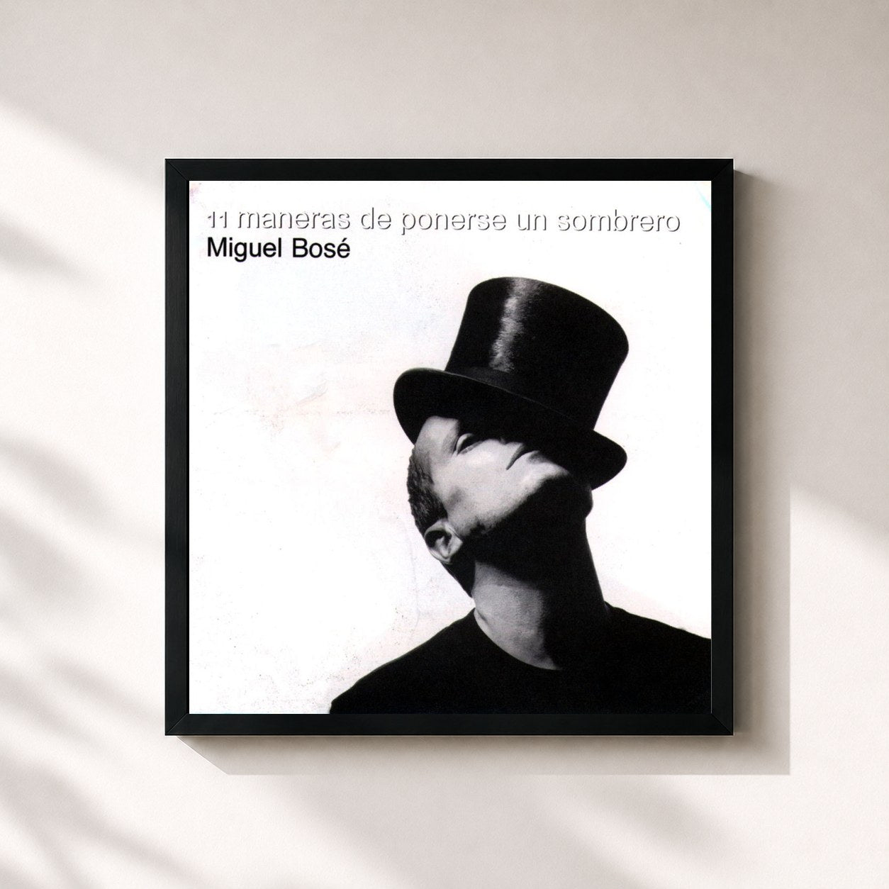 #noir Tableau carré de l'album 11 Maneras De Ponerse Un Sombrero de Miguel Bosé, cadre noir 32x32 cm