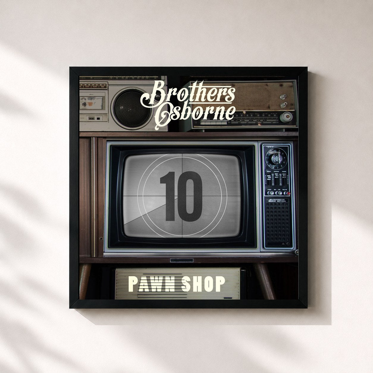 #noir Tableau carré de l'album Pawn Shop (10 Year Anniversary Edition) de Brothers Osborne, cadre noir 32x32 cm