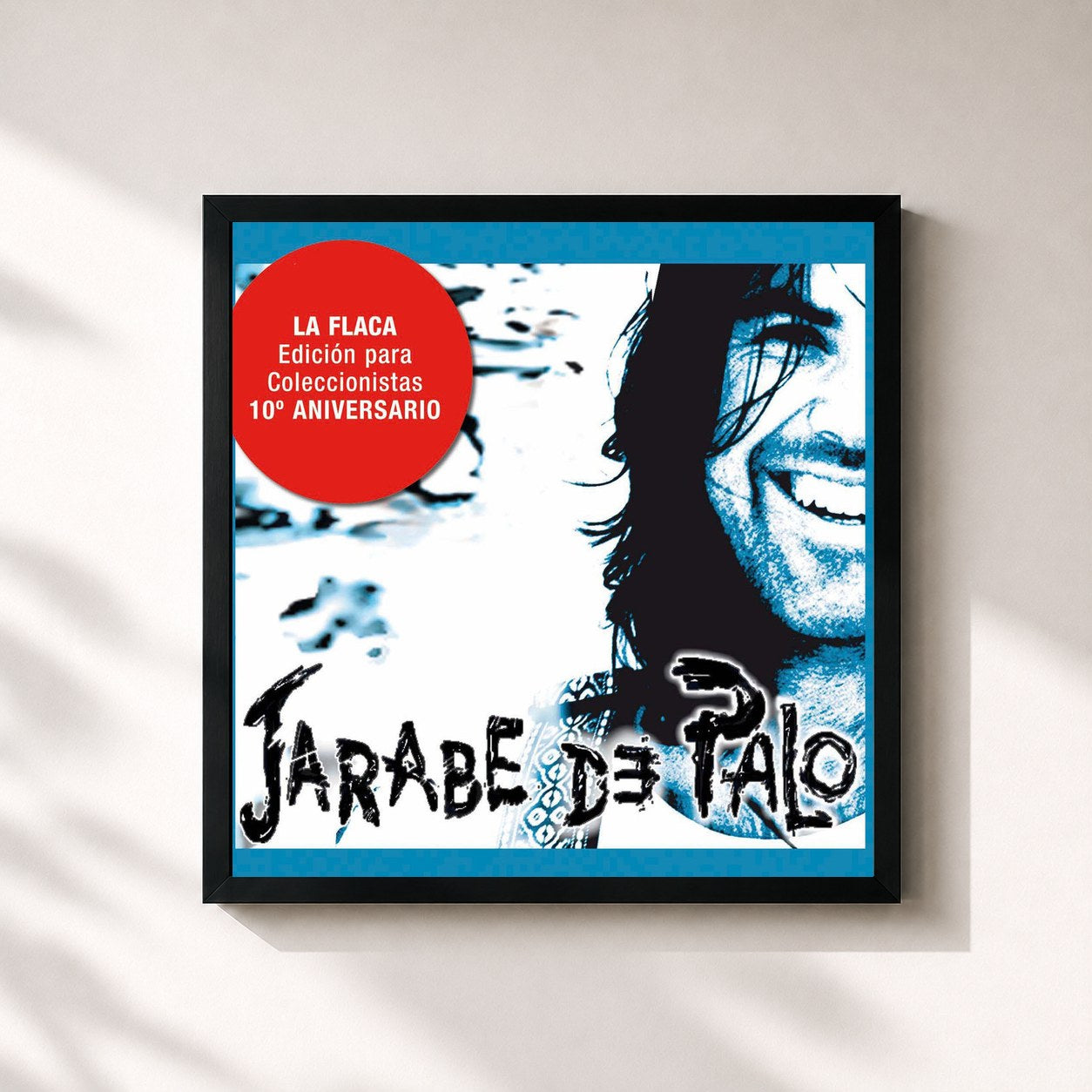 #noir Tableau carré de l'album La Flaca - Edición 10º Aniversario de Jarabe de Palo, cadre noir 32x32 cm