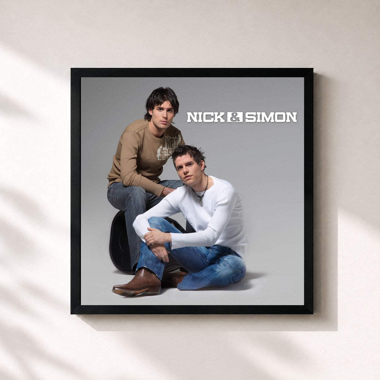 #noir Tableau carré de l'album Nick & Simon de Nick & Simon, cadre noir 32x32 cm
