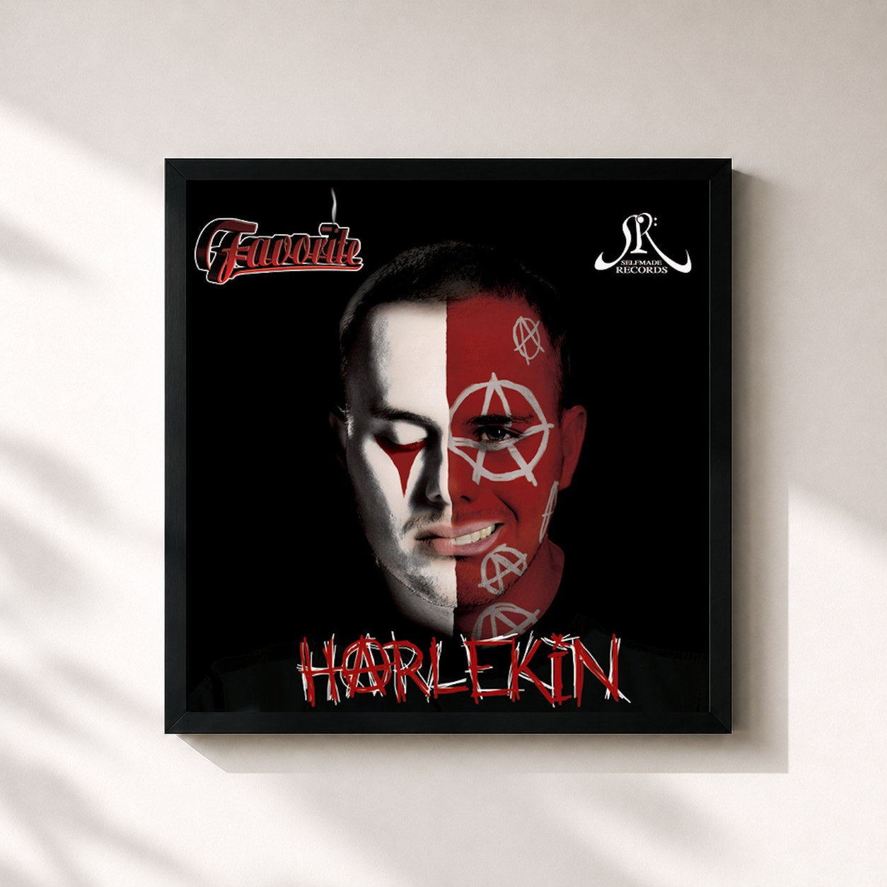 #noir Tableau carré de l'album Harlekin de Favorite, cadre noir 32x32 cm