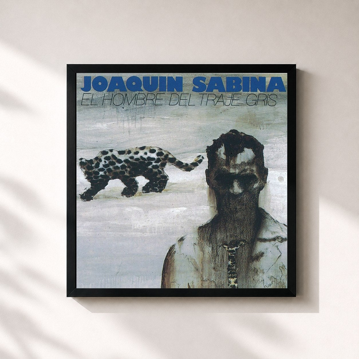 #noir Tableau carré de l'album El Hombre Del Traje Gris de Joaquín Sabina, cadre noir 32x32 cm