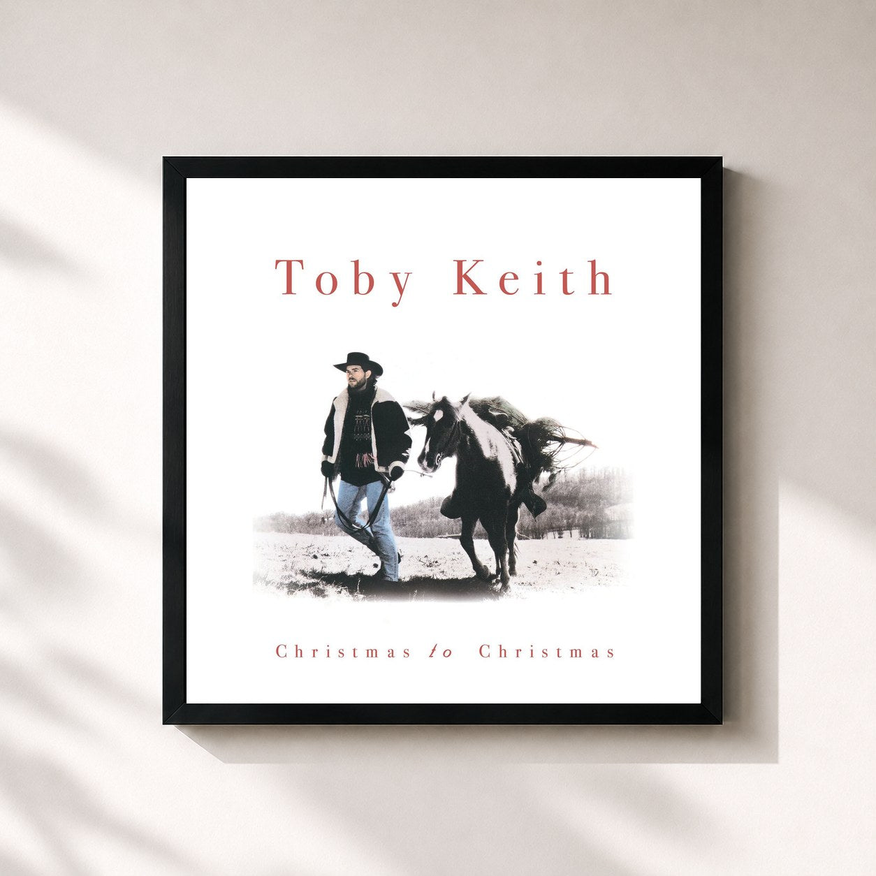 #noir Tableau carré de l'album Christmas To Christmas de Toby Keith, cadre noir 32x32 cm