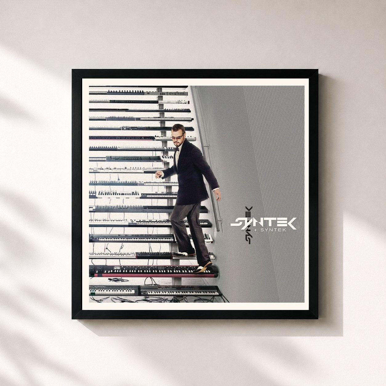 #noir Tableau carré de l'album Syntek de Aleks Syntek, cadre noir 32x32 cm