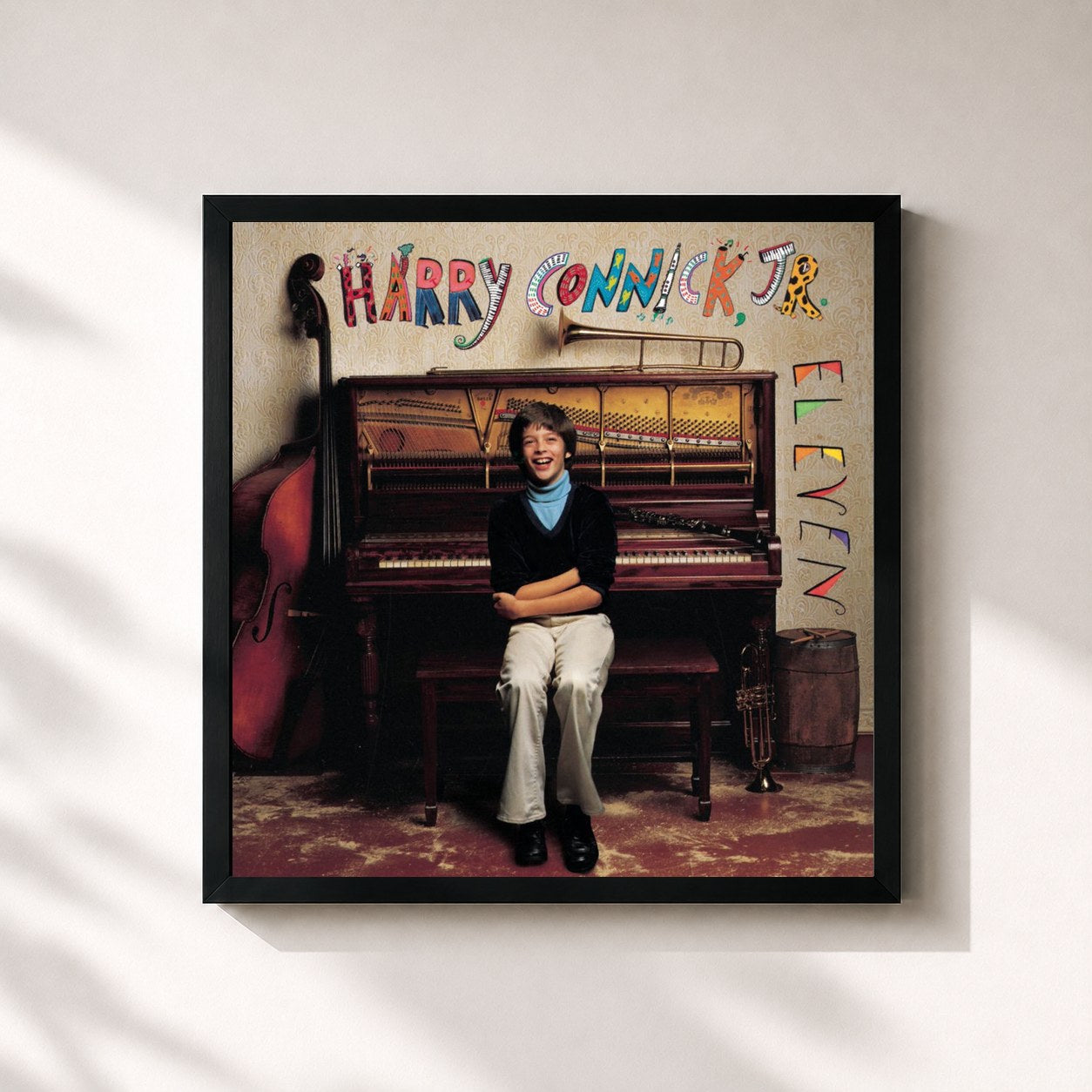 #noir Tableau carré de l'album Eleven de Harry Connick Jr., cadre noir 32x32 cm