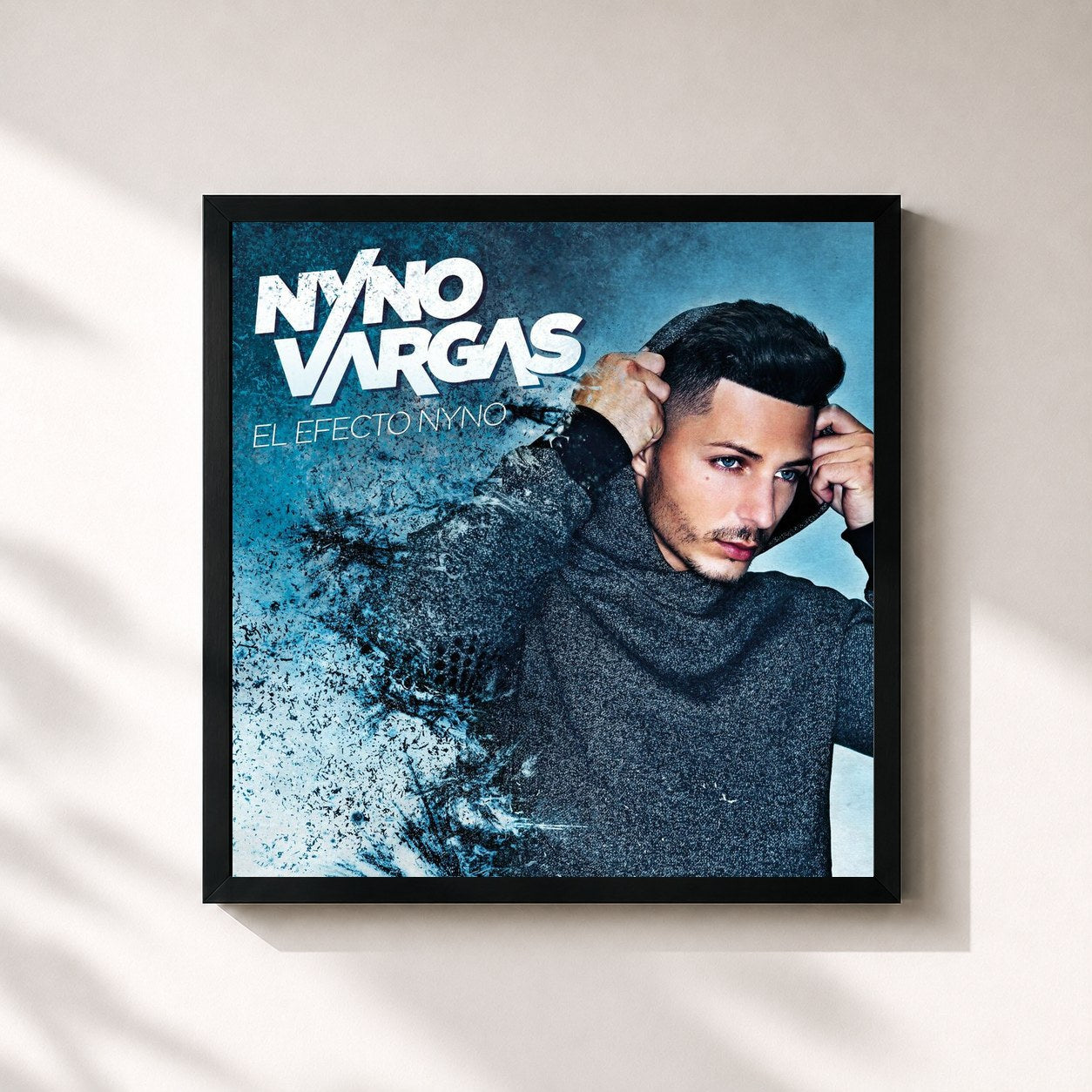 #noir Tableau carré de l'album El Efecto Nyno de Nyno Vargas, cadre noir 32x32 cm
