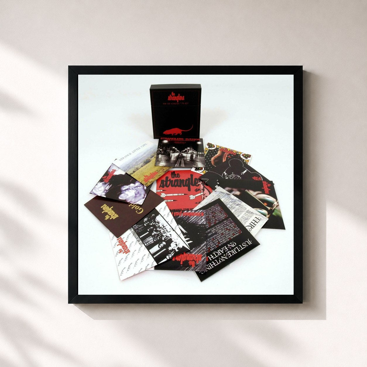 #noir Tableau carré de l'album The UA Singles '79-'82 de The Stranglers, cadre noir 32x32 cm
