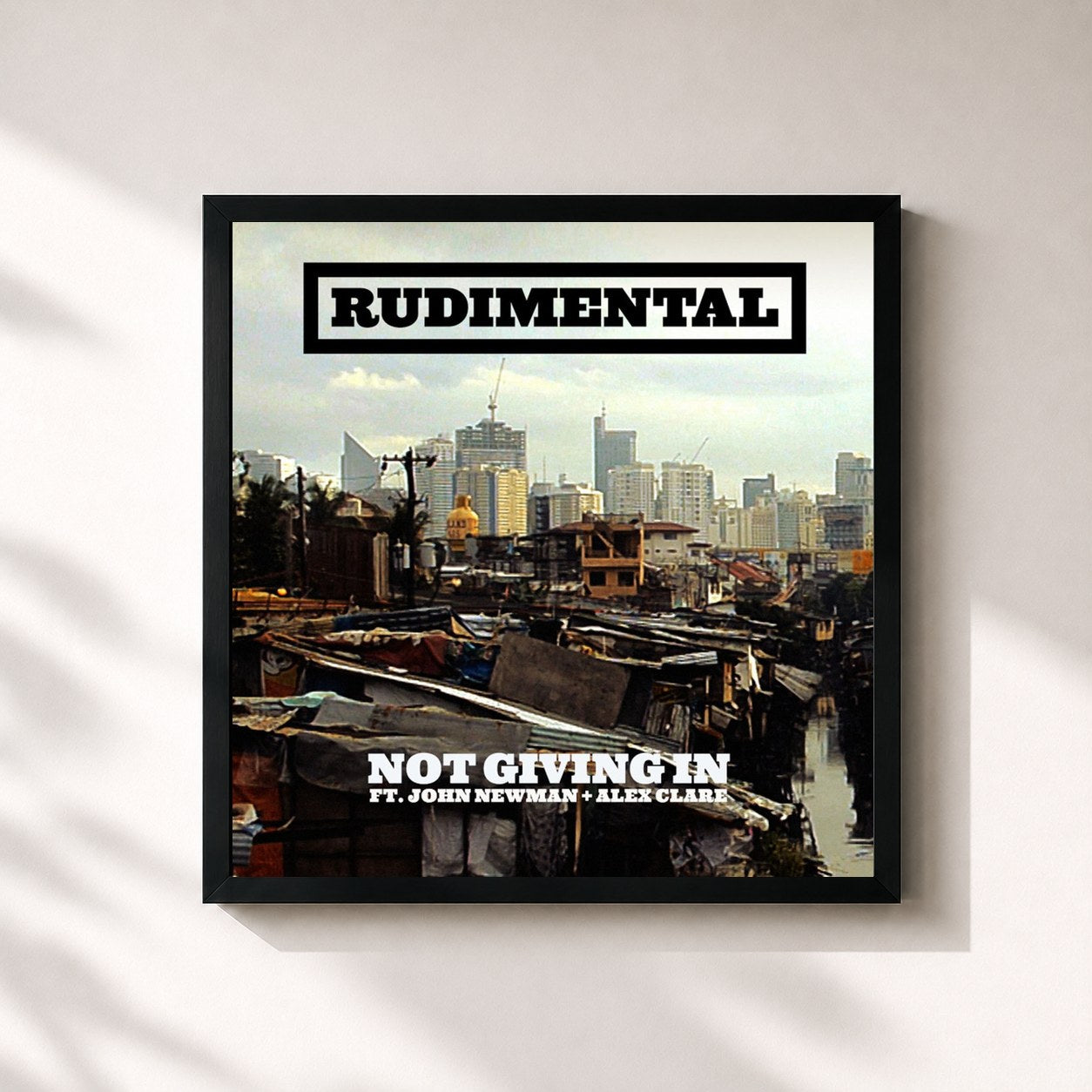 #noir Tableau carré de l'album Not Giving In (feat. John Newman & Alex Clare) de Rudimental, cadre noir 32x32 cm