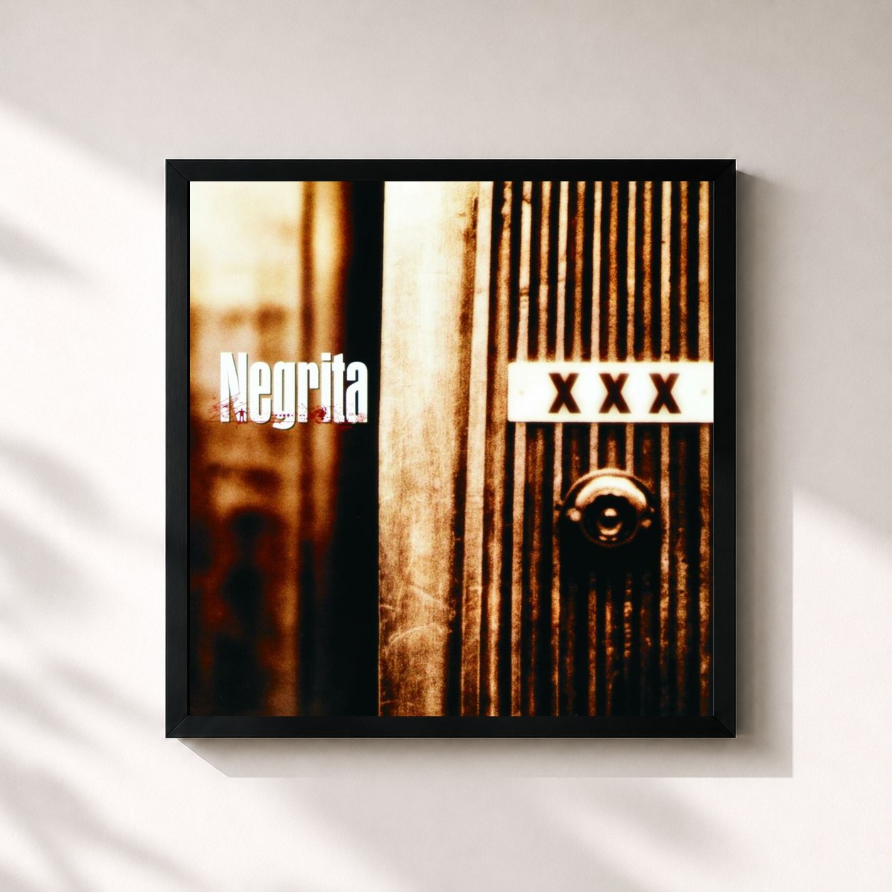 #noir Tableau carré de l'album Xxx de Negrita, cadre noir 32x32 cm