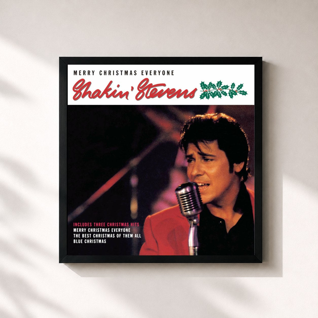 #noir Tableau carré de l'album Merry Christmas Everyone de Shakin' Stevens, cadre noir 32x32 cm