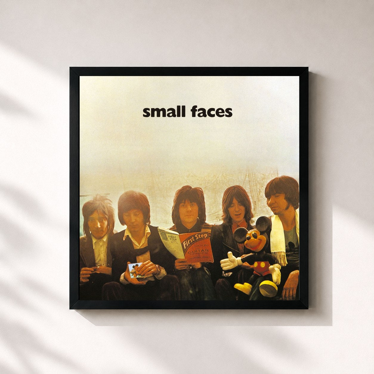 #noir Tableau carré de l'album First Step de Faces, cadre noir 32x32 cm