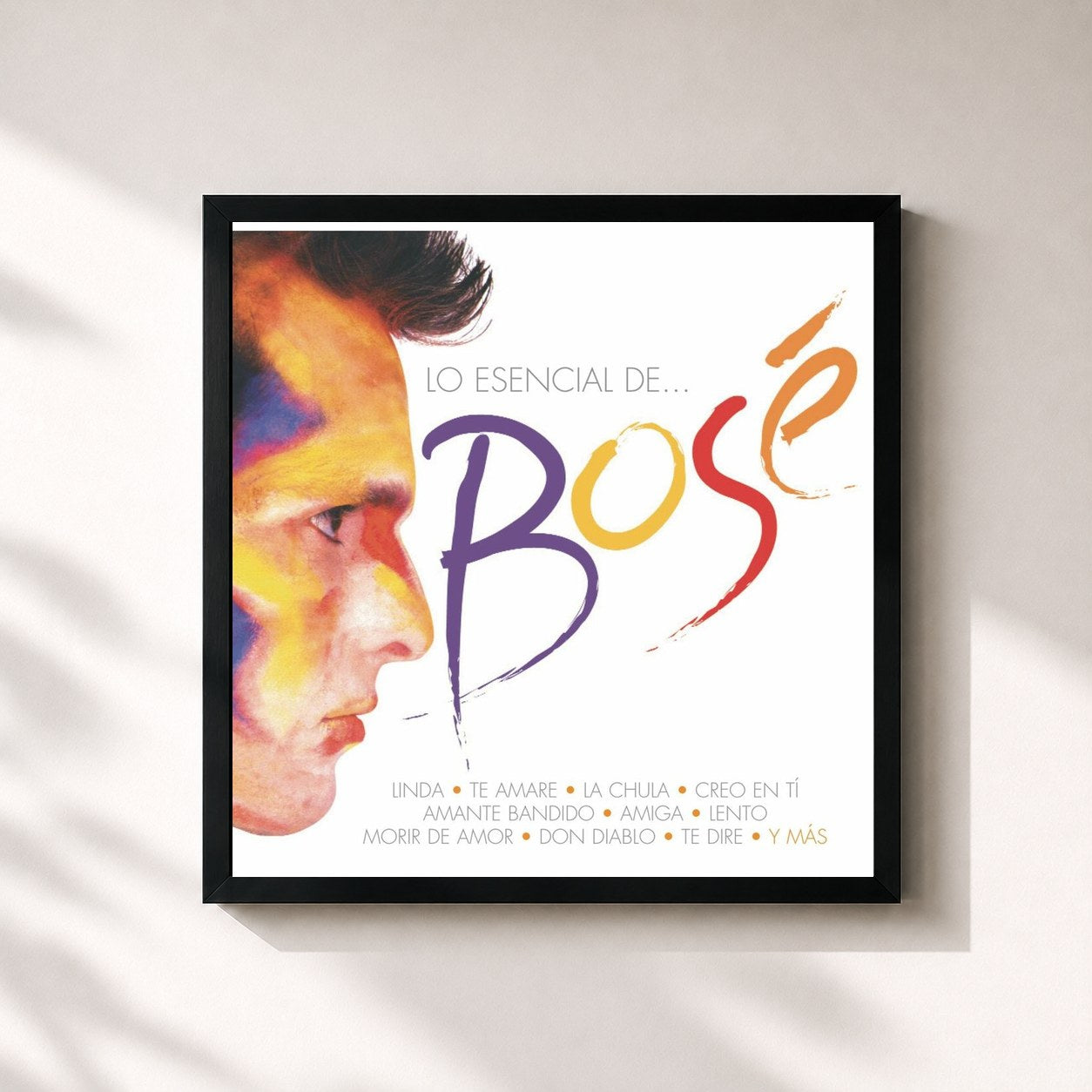#noir Tableau carré de l'album Lo Esencial de Miguel Bose de Miguel Bosé, cadre noir 32x32 cm