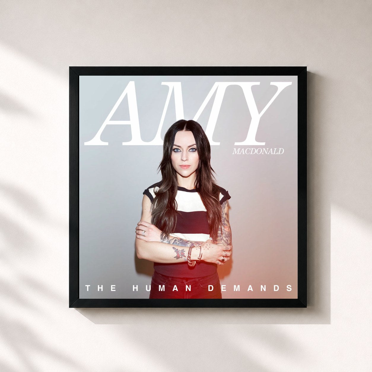 #noir Tableau carré de l'album The Human Demands de Amy Macdonald, cadre noir 32x32 cm