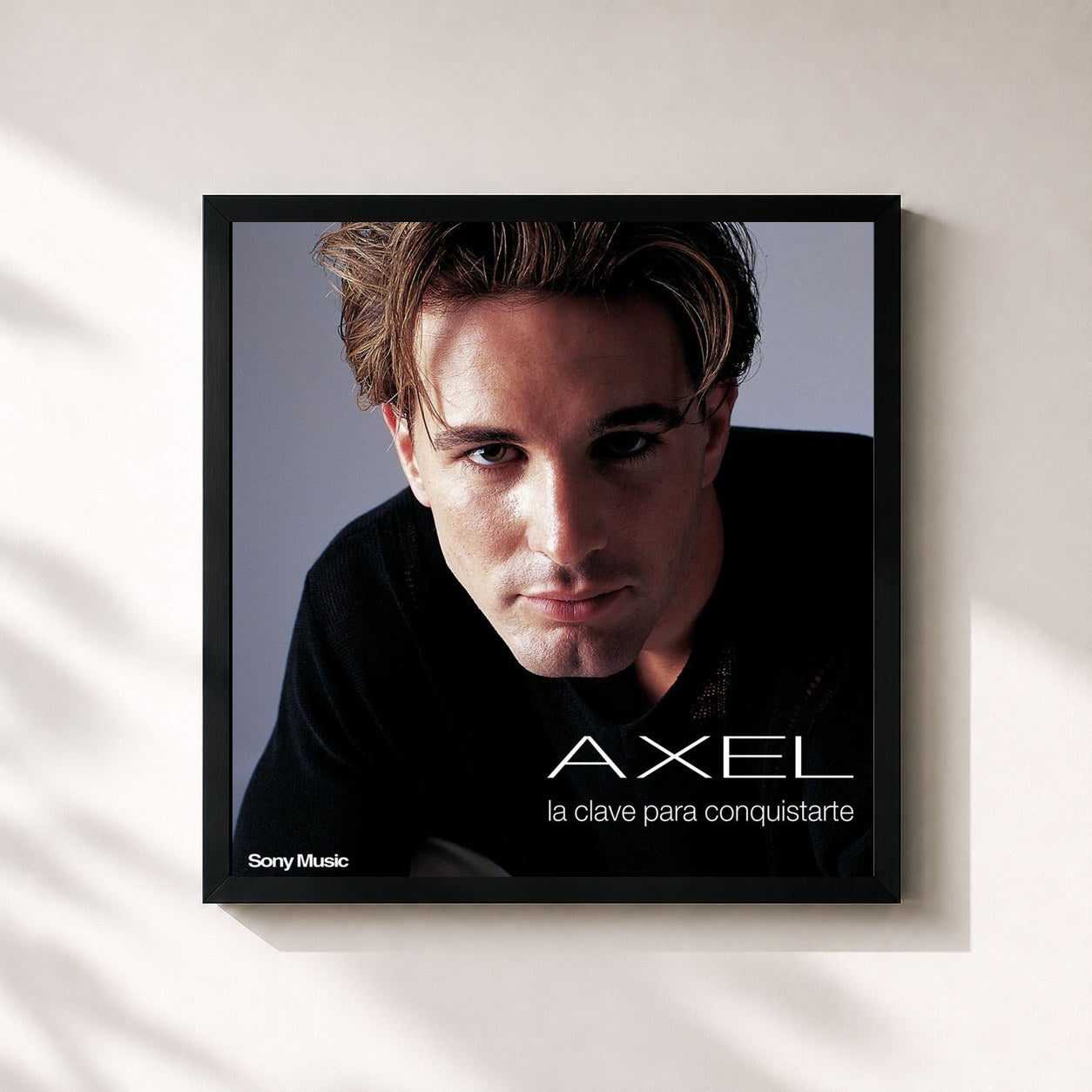 #noir Tableau carré de l'album La Clave para Conquistarte de Axel, cadre noir 32x32 cm