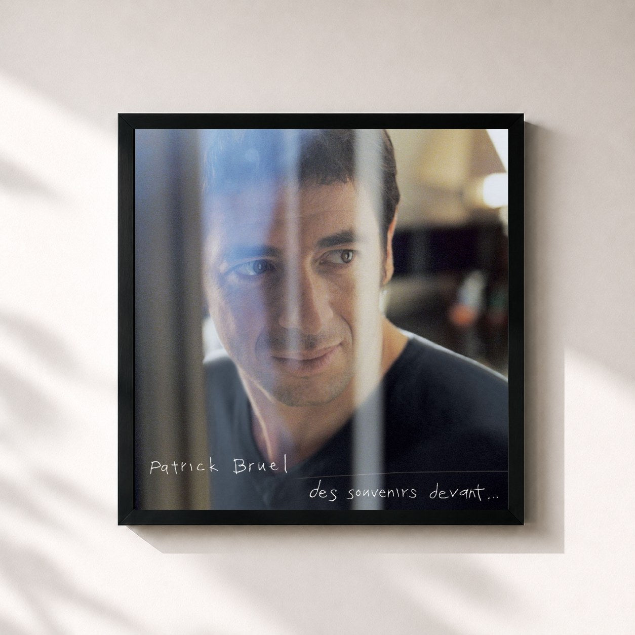 #noir Tableau carré de l'album Des souvenirs devant... de Patrick Bruel, cadre noir 32x32 cm