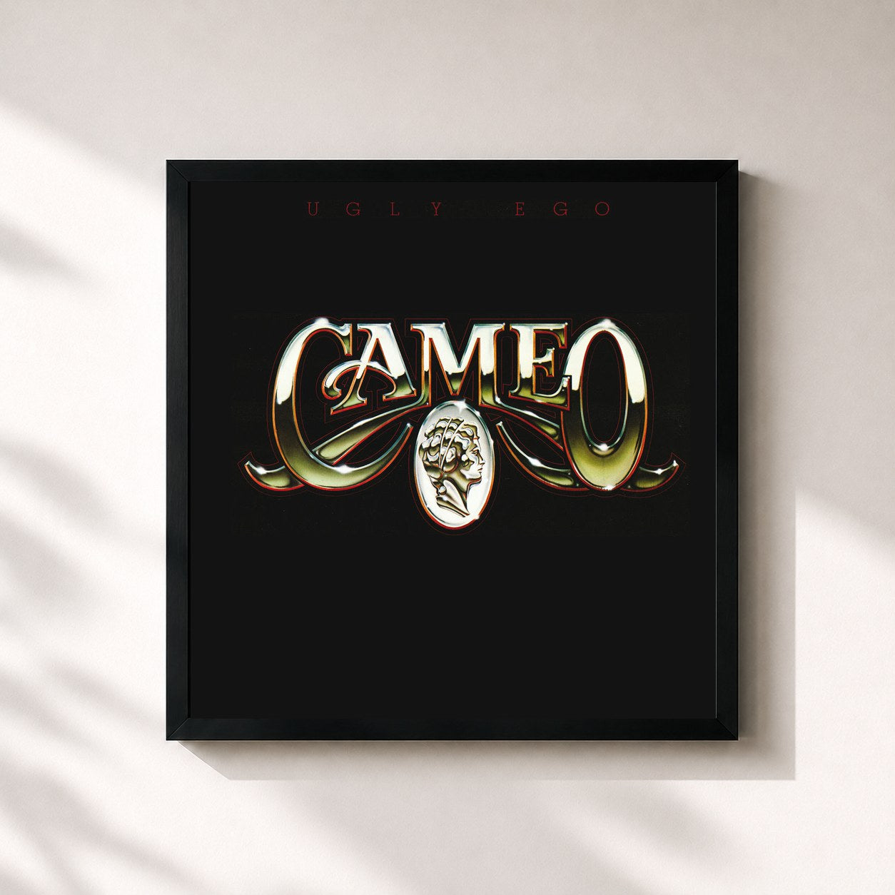 #noir Tableau carré de l'album Ugly Ego de Cameo, cadre noir 32x32 cm