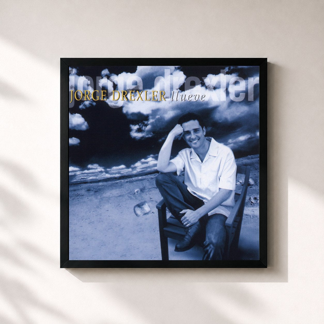 #noir Tableau carré de l'album Llueve de Jorge Drexler, cadre noir 32x32 cm