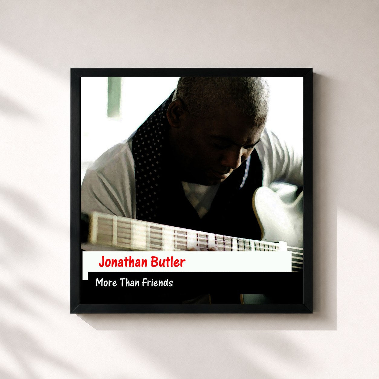 #noir Tableau carré de l'album More Than Friends de Jonathan Butler, cadre noir 32x32 cm