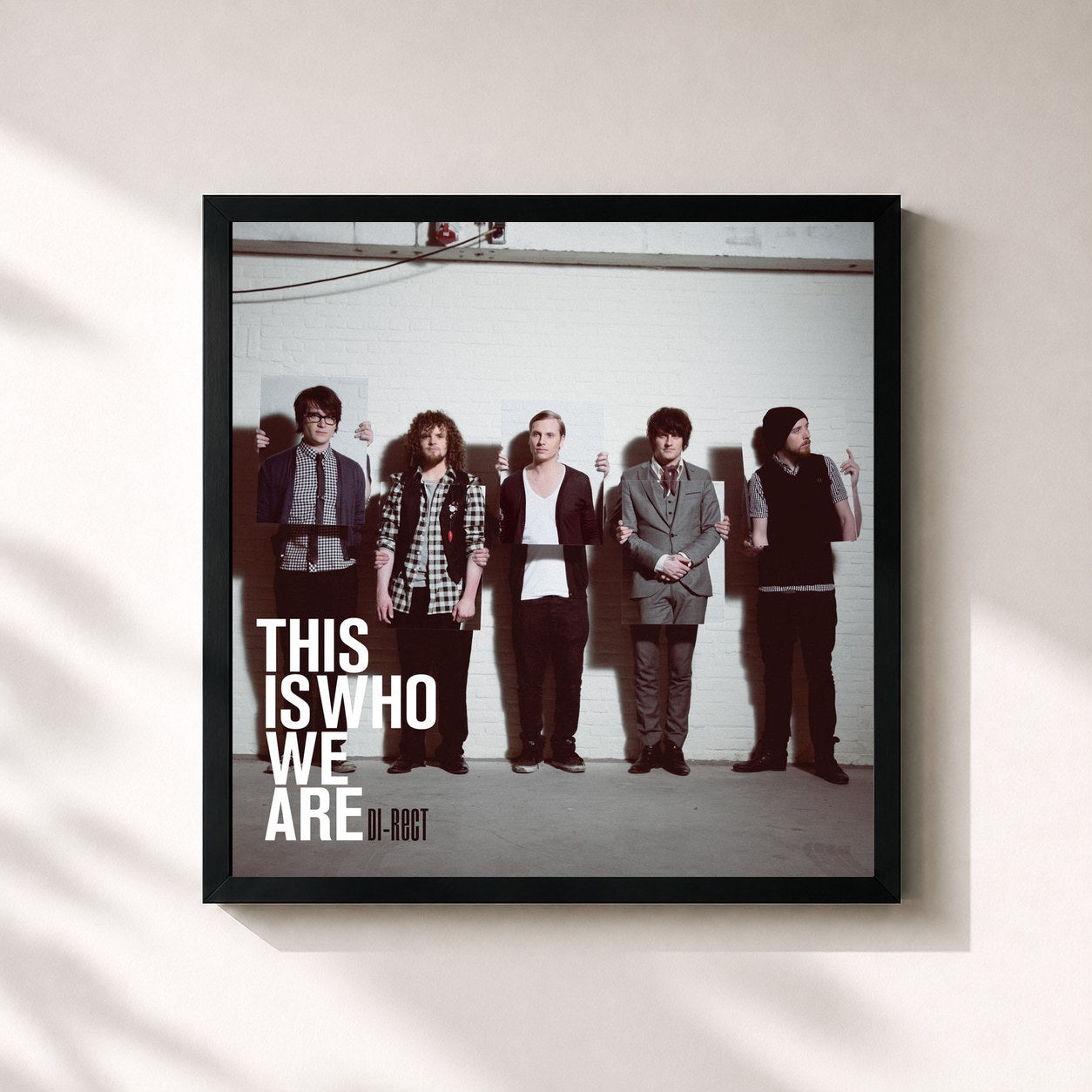 #noir Tableau carré de l'album This Is Who We Are de Di-rect, cadre noir 32x32 cm