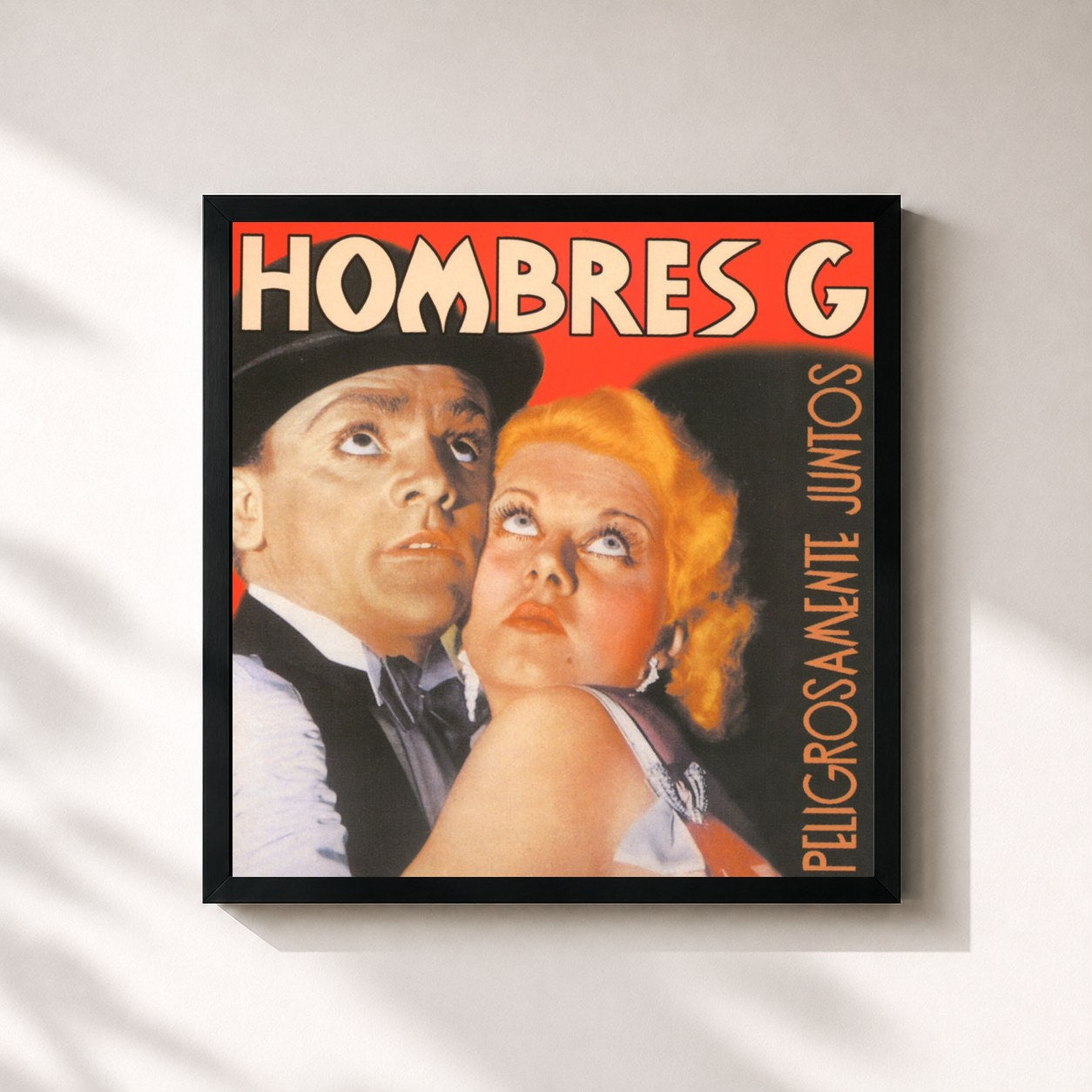 #noir Tableau carré de l'album Peligrosamente Juntos de Hombres G, cadre noir 32x32 cm