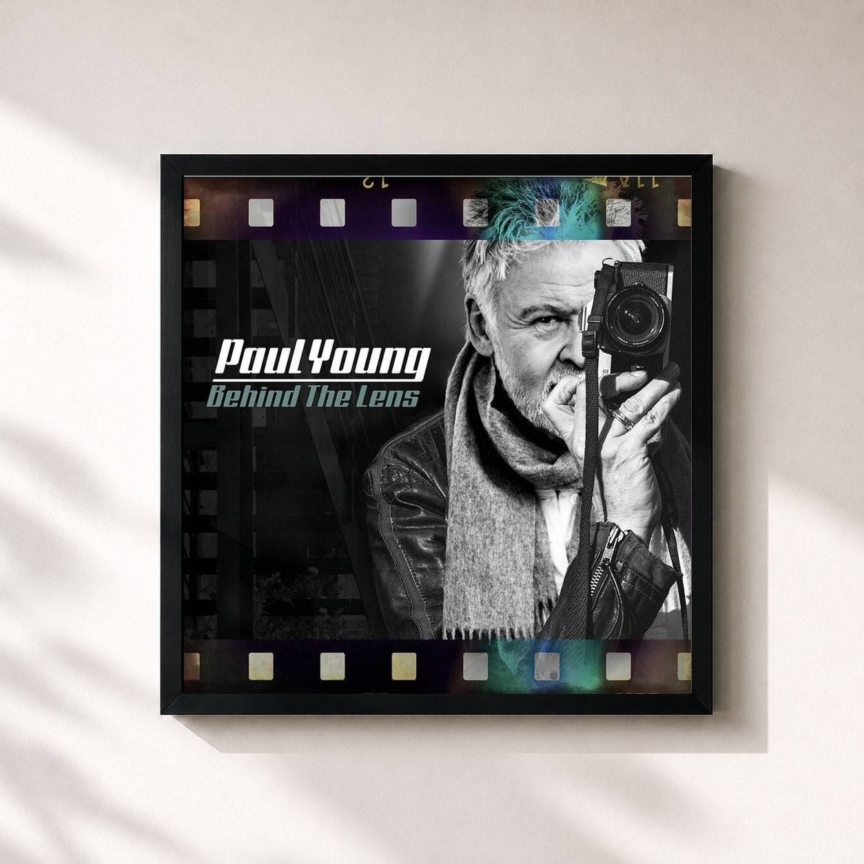 #noir Tableau carré de l'album Behind The Lens de Paul Young, cadre noir 32x32 cm