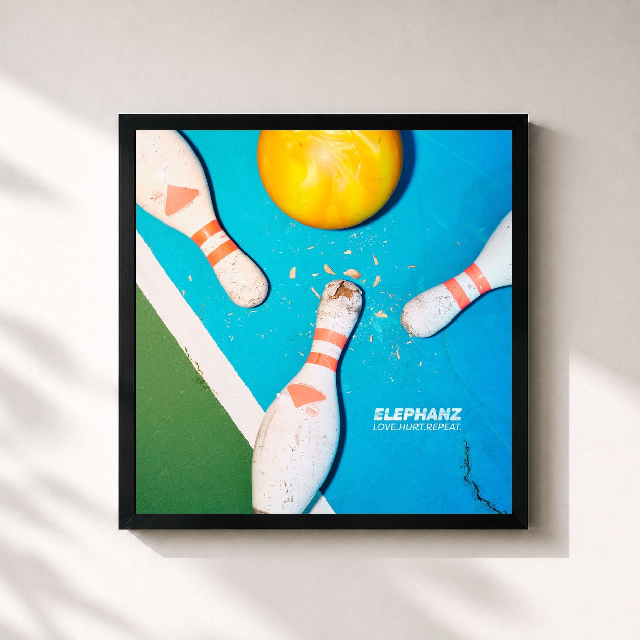 #noir Tableau carré de l'album LOVE. HURT. REPEAT. de Elephanz, cadre noir 32x32 cm