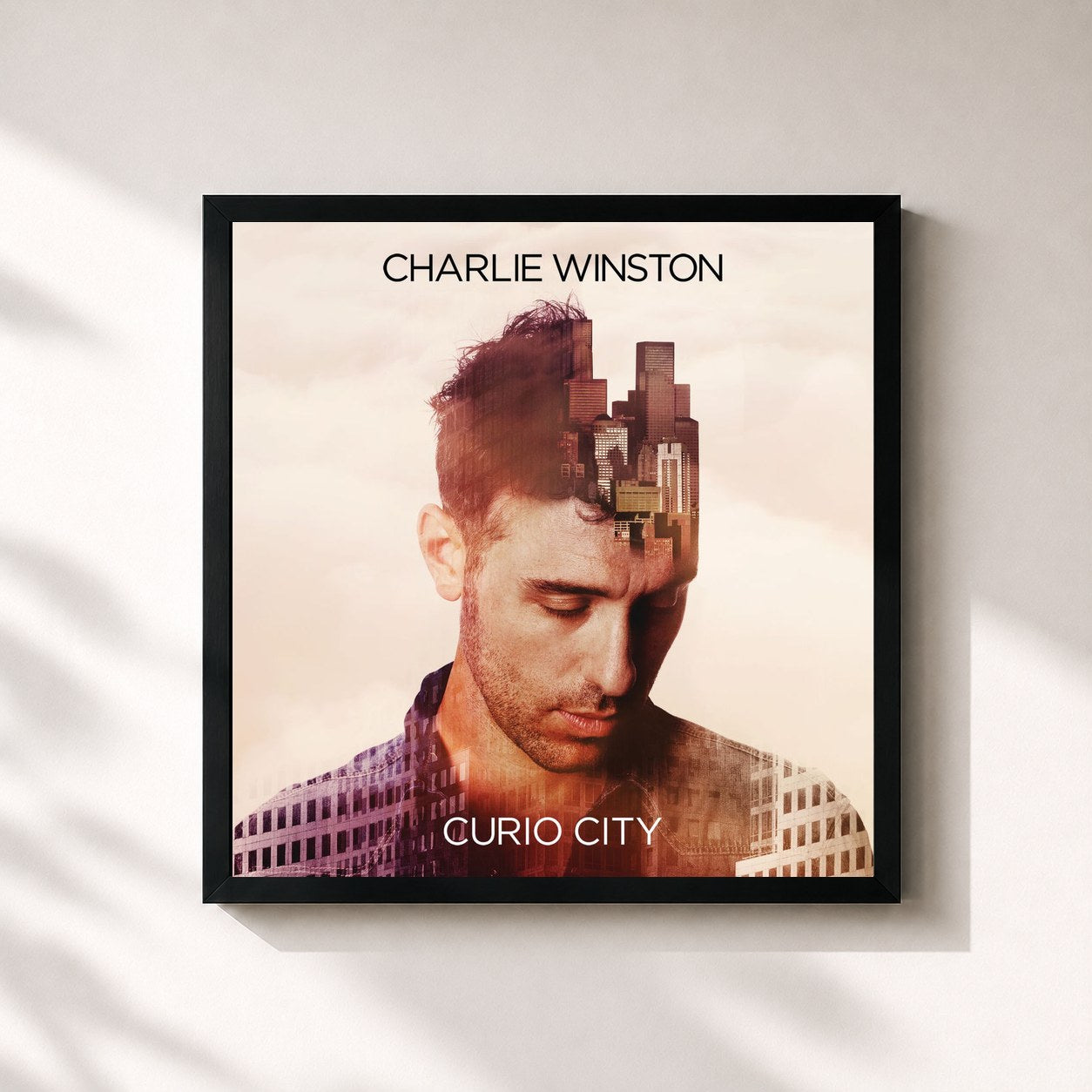 #noir Tableau carré de l'album Curio City de Charlie Winston, cadre noir 32x32 cm