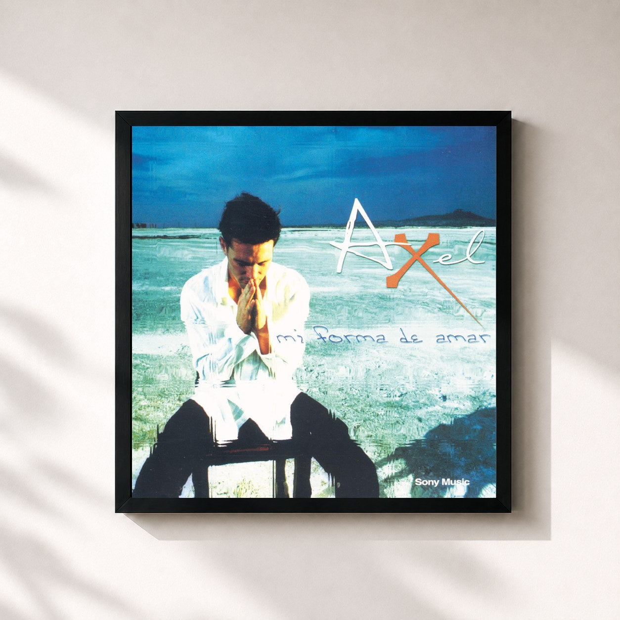 #noir Tableau carré de l'album Mi Forma de Amar de Axel, cadre noir 32x32 cm