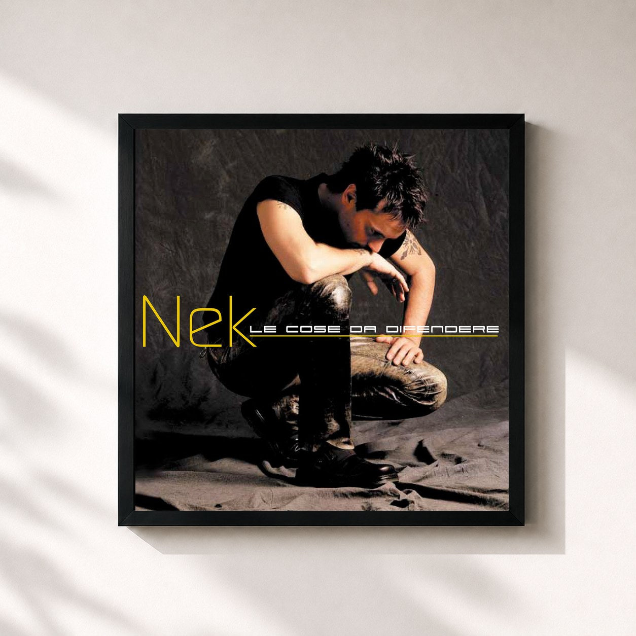 #noir Tableau carré de l'album Le cose da difendere de Nek, cadre noir 32x32 cm