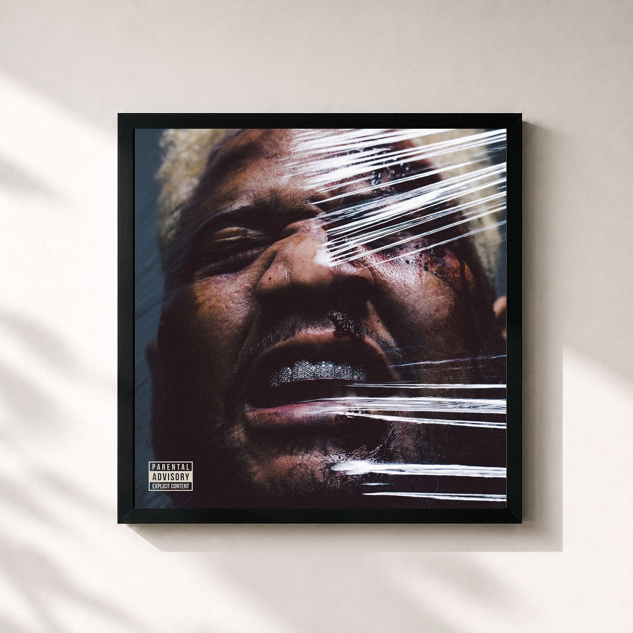 #noir Tableau carré de l'album Battered Bruised & Bloody de Carnage, cadre noir 32x32 cm