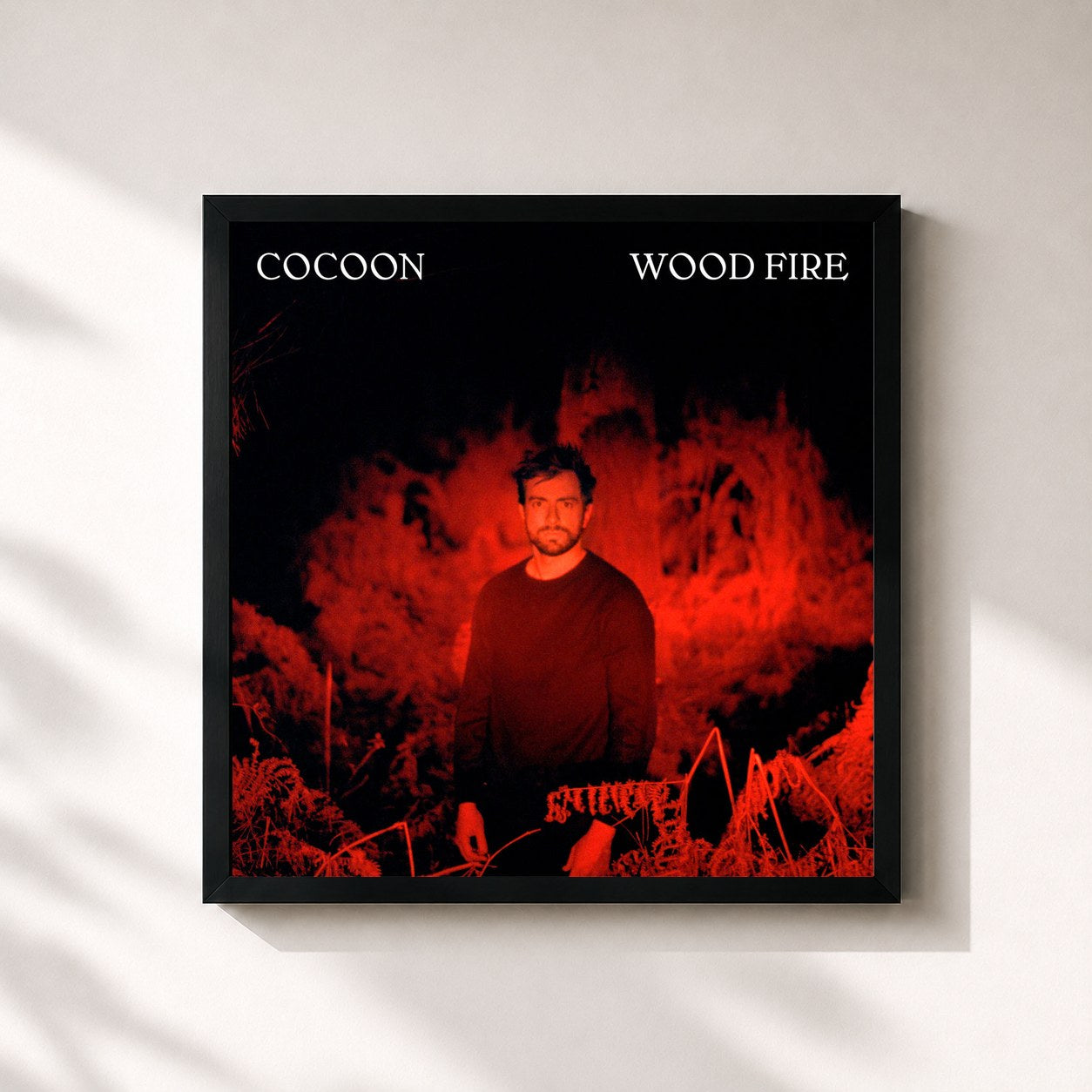 #noir Tableau carré de l'album Wood Fire de Cocoon, cadre noir 32x32 cm