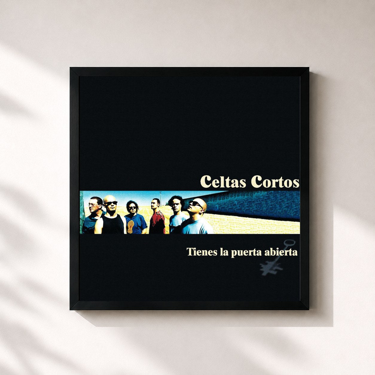 #noir Tableau carré de l'album Tienes La Puerta Abierta de Celtas Cortos, cadre noir 32x32 cm