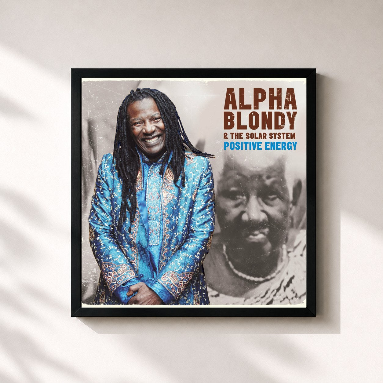 #noir Tableau carré de l'album Positive Energy de Alpha Blondy, cadre noir 32x32 cm