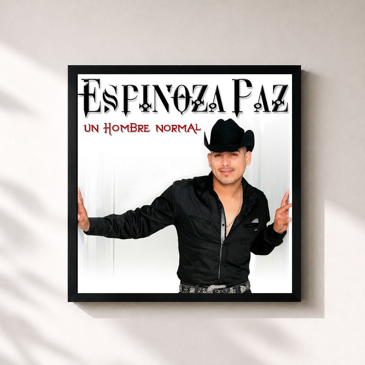 #noir Tableau carré de l'album Un Hombre Normal de Espinoza Paz, cadre noir 32x32 cm