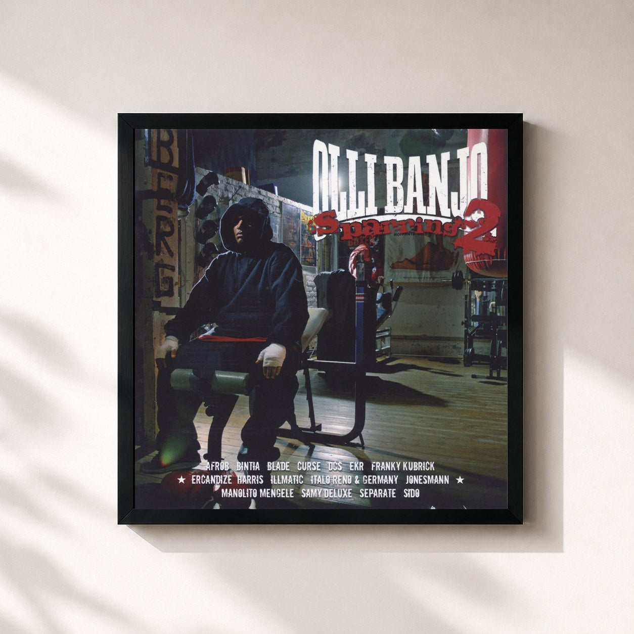 #noir Tableau carré de l'album Sparring 2 de Olli Banjo, cadre noir 32x32 cm