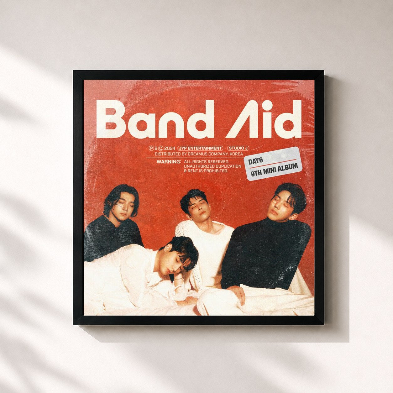 #noir Tableau carré de l'album Band Aid de DAY6 , cadre noir 32x32 cm