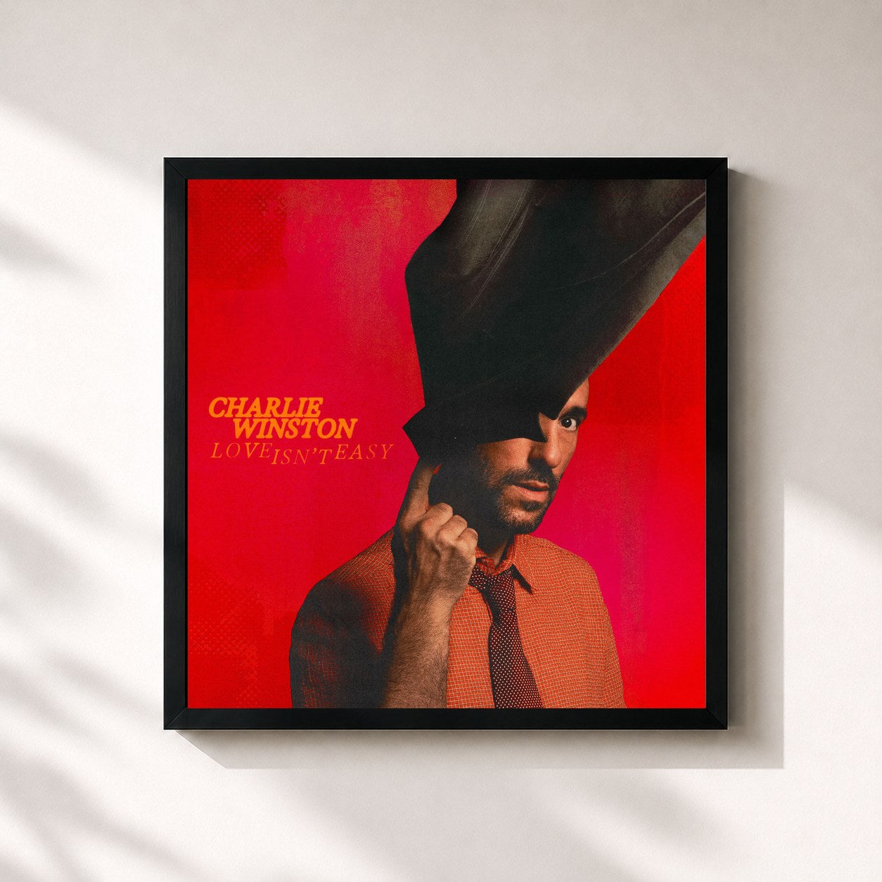 #noir Tableau carré de l'album Love Isn't Easy de Charlie Winston, cadre noir 32x32 cm