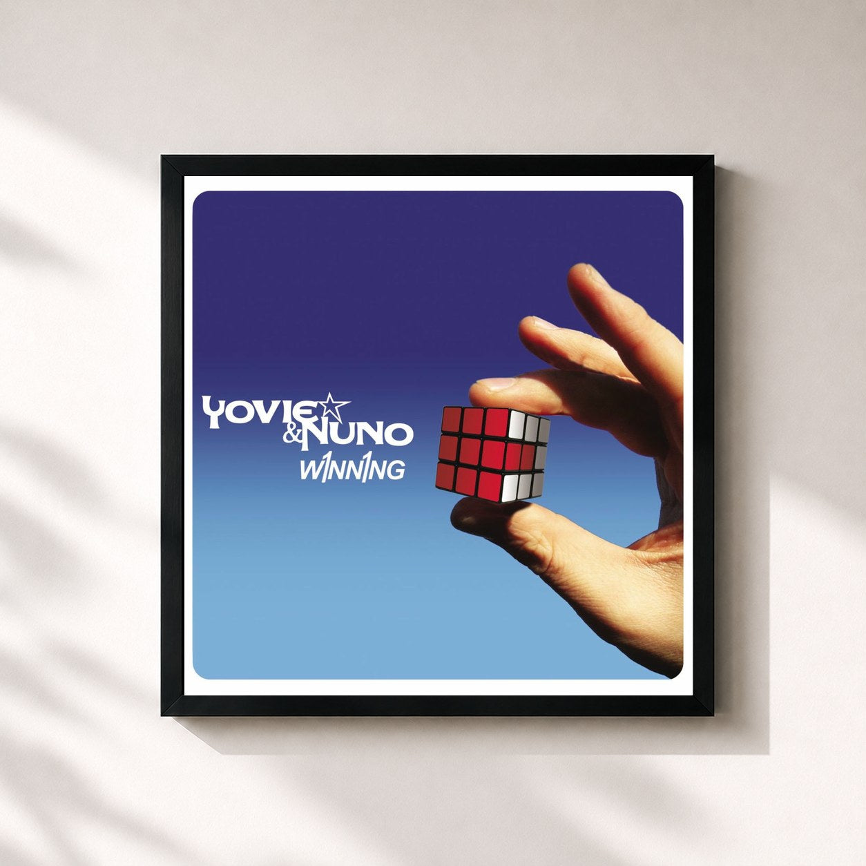 #noir Tableau carré de l'album Winning 11 de Yovie & Nuno, cadre noir 32x32 cm