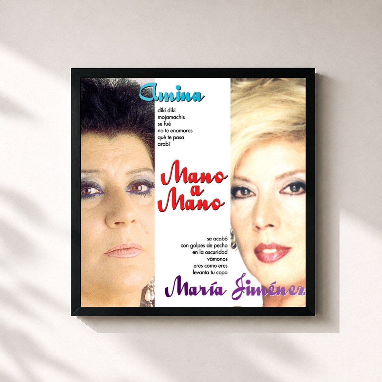 #noir Tableau carré de l'album Mano a Mano : Amina y Maria Jimenez de Maria Jimenez, cadre noir 32x32 cm
