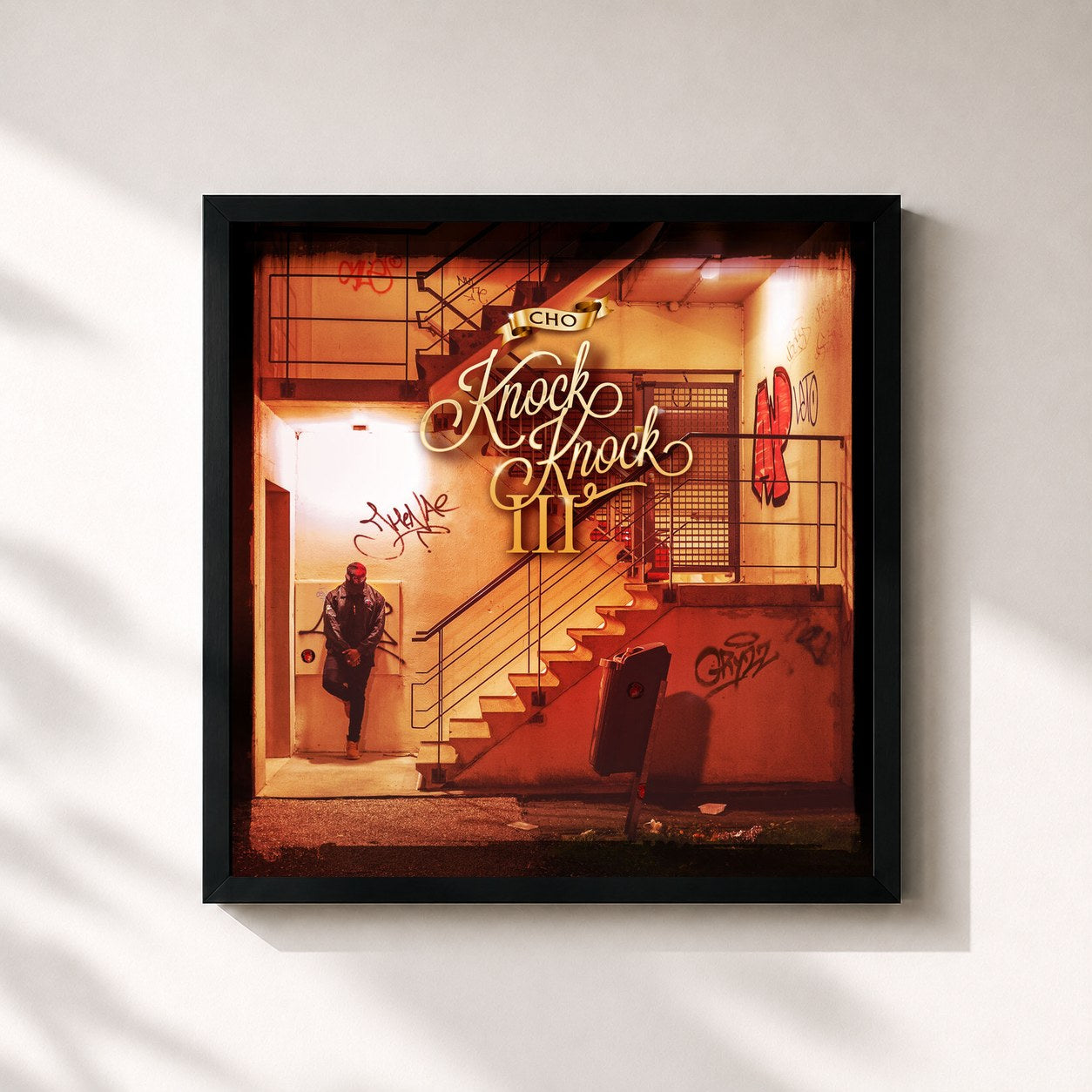 #noir Tableau carré de l'album Knock Knock 3 de CHO, cadre noir 32x32 cm