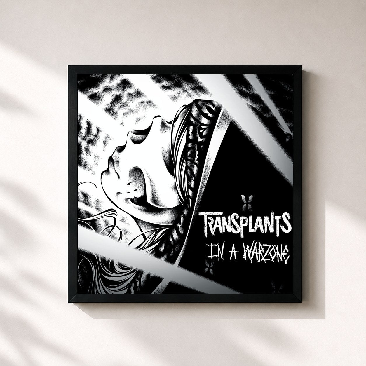 #noir Tableau carré de l'album In A Warzone de Transplants, cadre noir 32x32 cm
