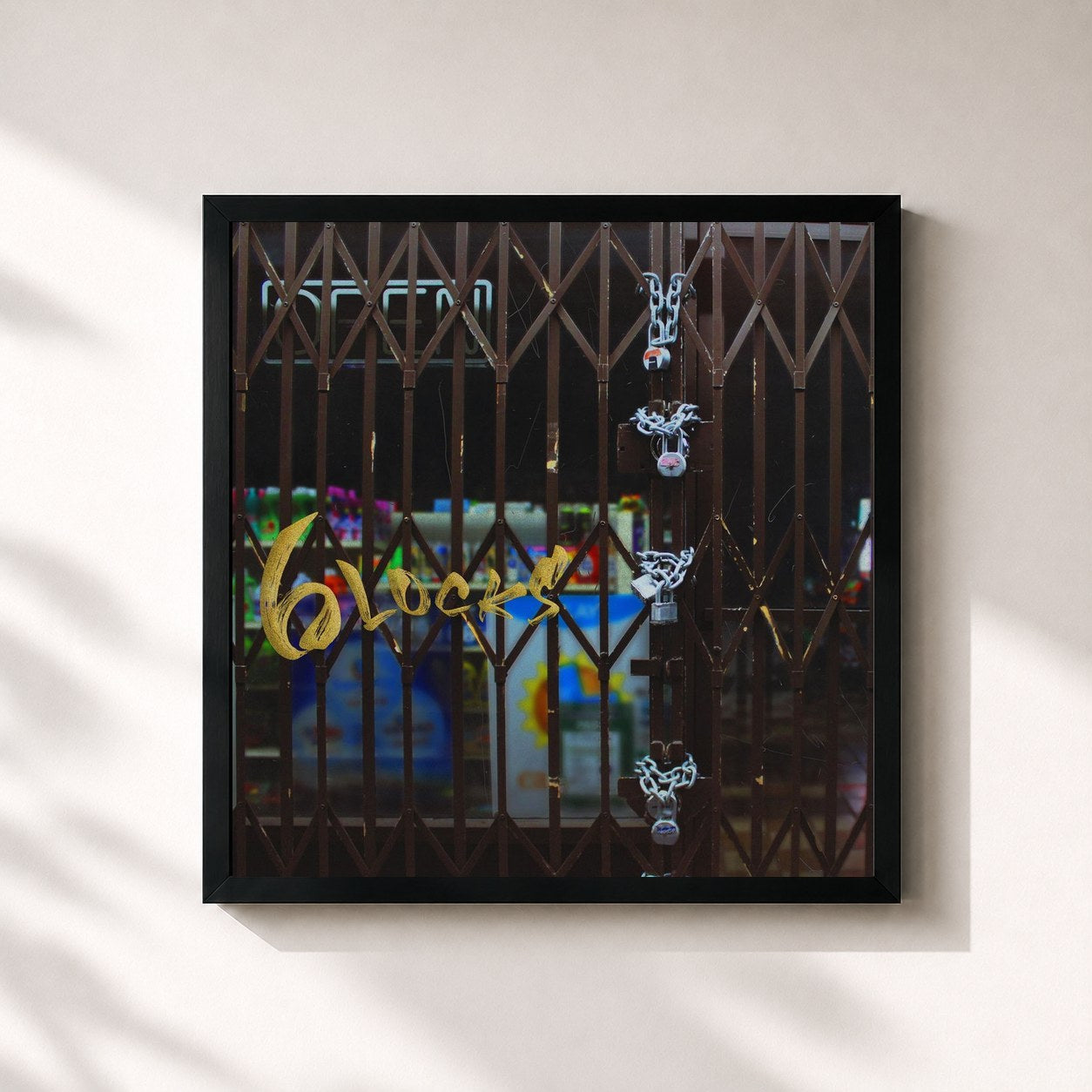 #noir Tableau carré de l'album 6locks de Khan, cadre noir 32x32 cm