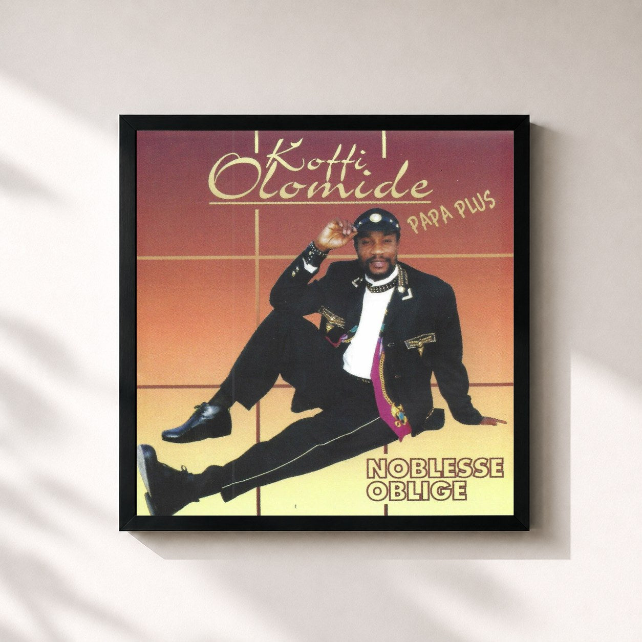 #noir Tableau carré de l'album Noblesse oblige de Koffi Olomidé, cadre noir 32x32 cm