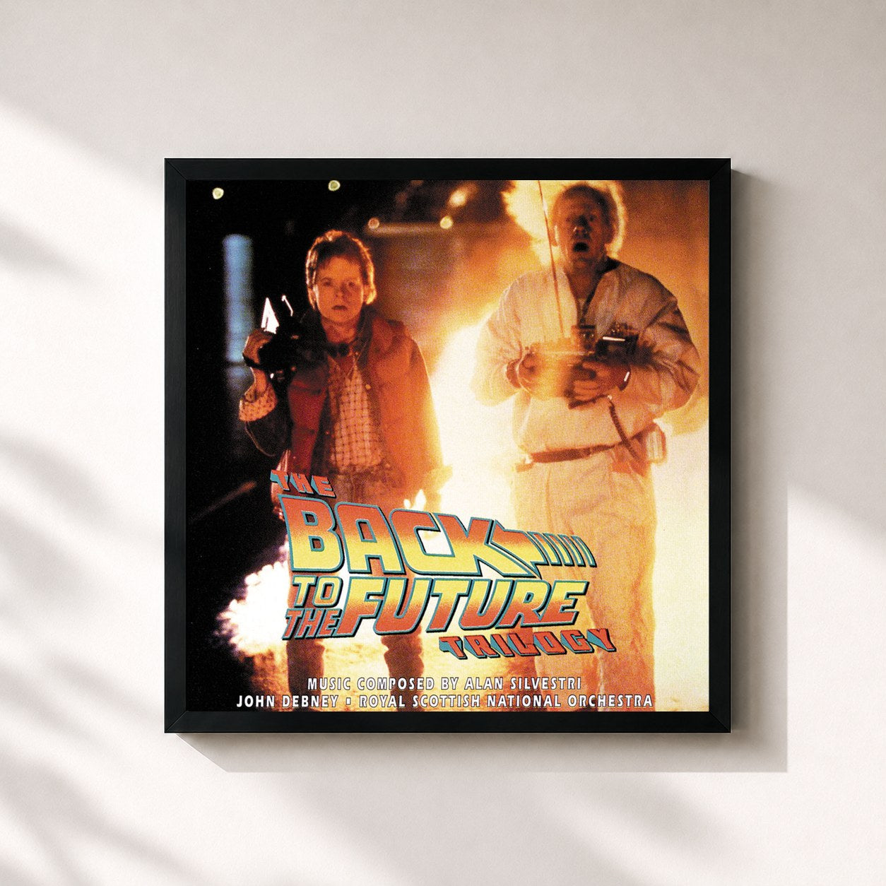 #noir Tableau carré de l'album The Back To The Future Trilogy de Alan Silvestri, cadre noir 32x32 cm