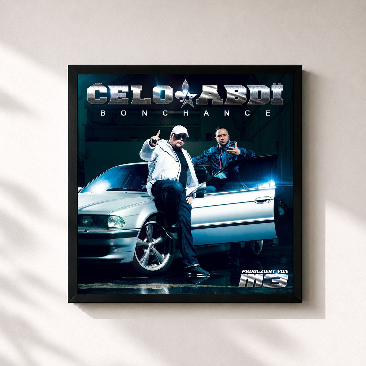 #noir Tableau carré de l'album Bonchance de Celo & Abdi, cadre noir 32x32 cm