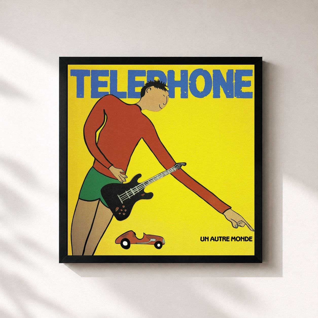 #noir Tableau carré de l'album Un Autre Monde de Telephone, cadre noir 32x32 cm